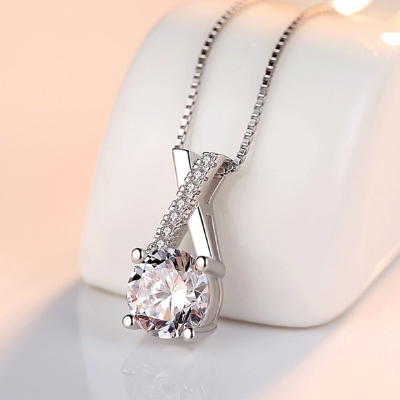 Sterling Silver Criss-Cross Stunning Simulated Diamond Silver Pendant Necklace